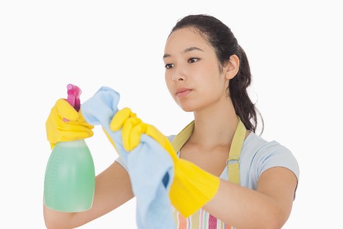 Carpet cleaning team preparing safely with protective equipment and cleaning tools
